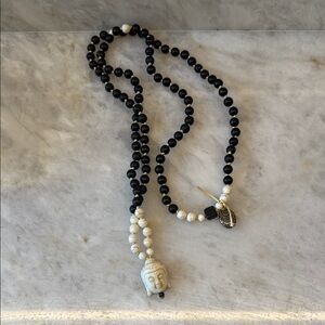 Mala Beaded Necklace, Onyx/Ivory with Buddha Pendant. Follow Your Heart charm.